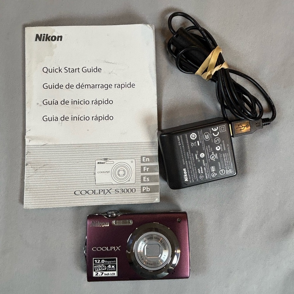 Nikon Coolpix S3000 12MP Digital Camera  Purple Parts Only‎